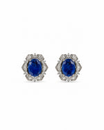 Neel Jharokha Stud Earrings: silver-plated oval studs with a blue stone and American diamond baguettes