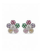 Rangoli Bloom Earrings: silver-tone brass flower studs with American diamonds and multi-coloured stones