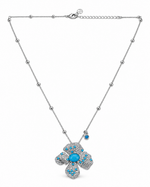 Firoza Blossom Pendant Set: silver-tone brass flower necklace with American diamonds and turquoise-blue stones