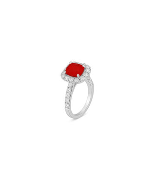 Ruhani Ring with a red gemstone and diamond-studded band on a white background | Adila Jewels