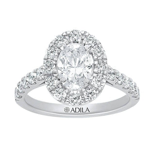 The Halo Oval Ring with Diamonds in Gold - Adila