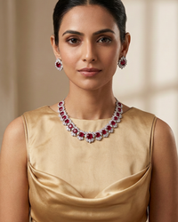 Model in a golden gown with a higher cowl neckline